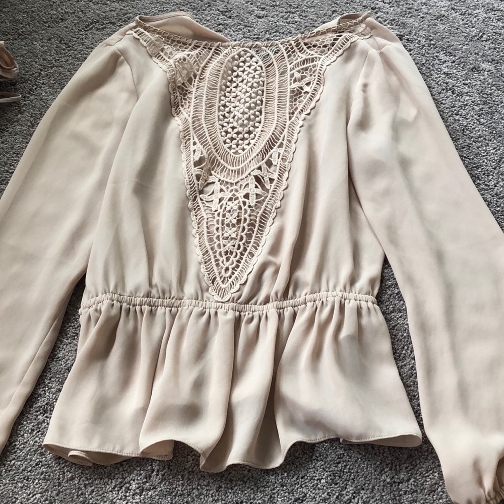 sheer, cream blouse